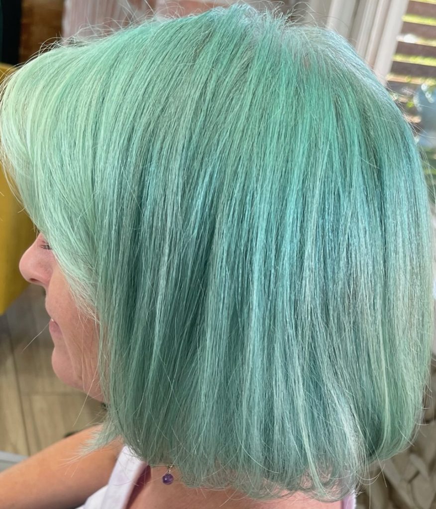 pastel mint green hair color on short bob by Oklahoma City master colorist Jennifer Bass Billman